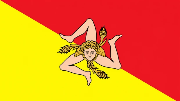 Bandiera della Regione Siciliana con Triscele su sfondo giallo e rosso