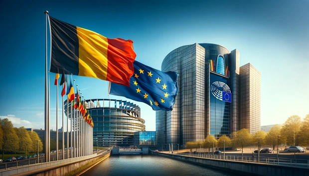 Bandiere del Belgio e dell'Unione Europea sventolanti davanti al Parlamento Europeo nella capitale Bruxelles